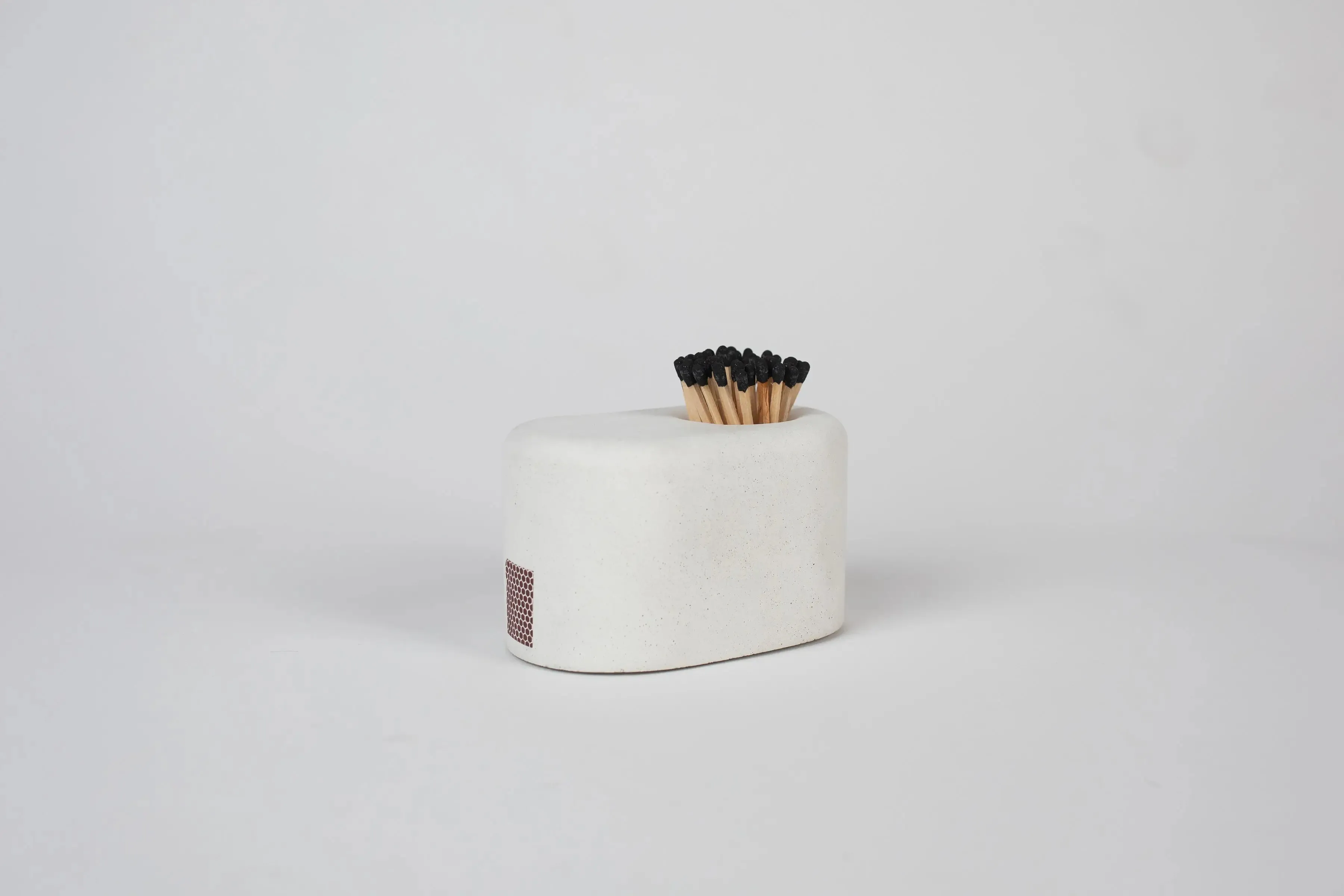 White Streamliner Match Holder with Black Matches