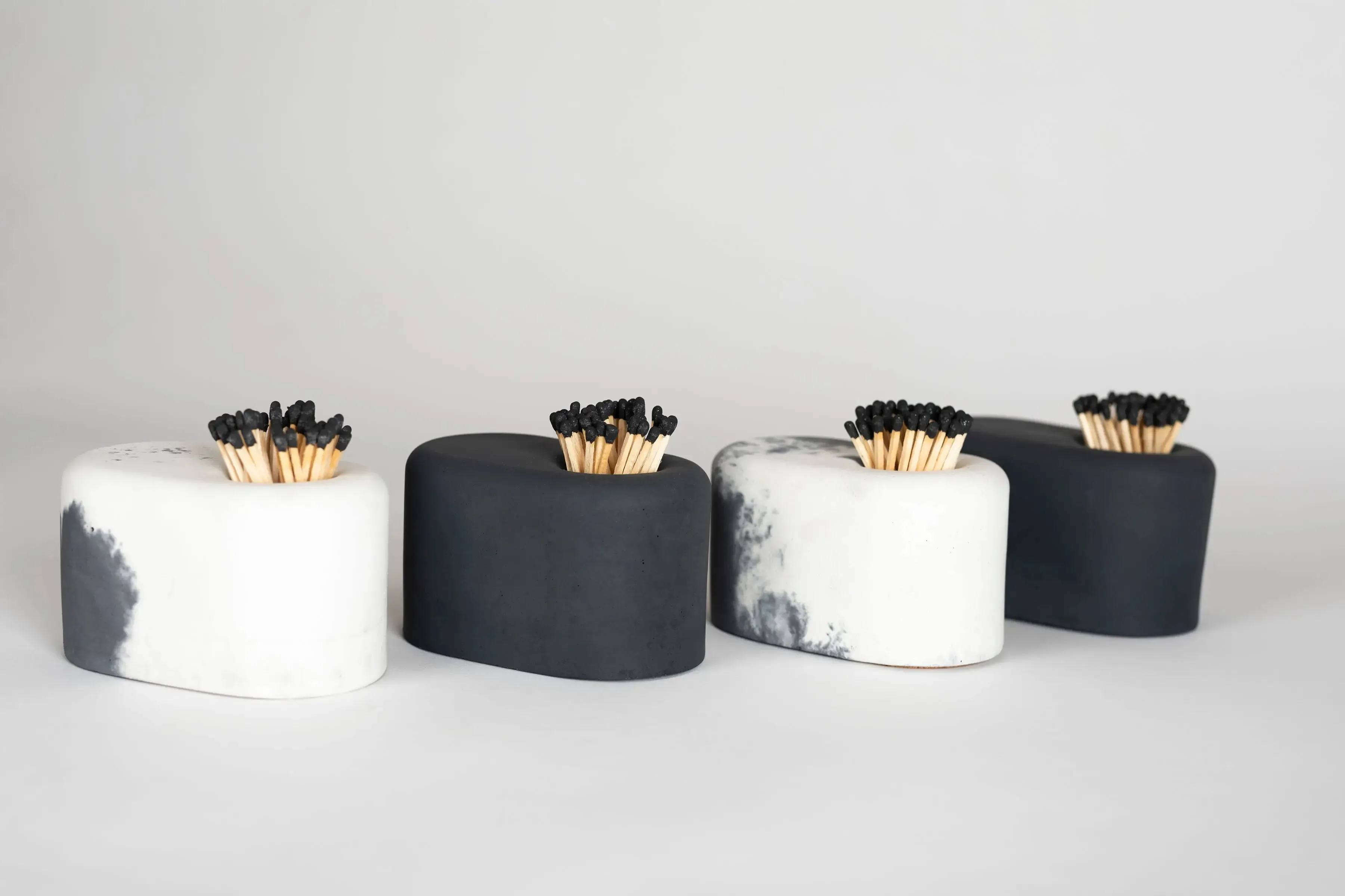 White Streamliner Match Holder with Black Matches