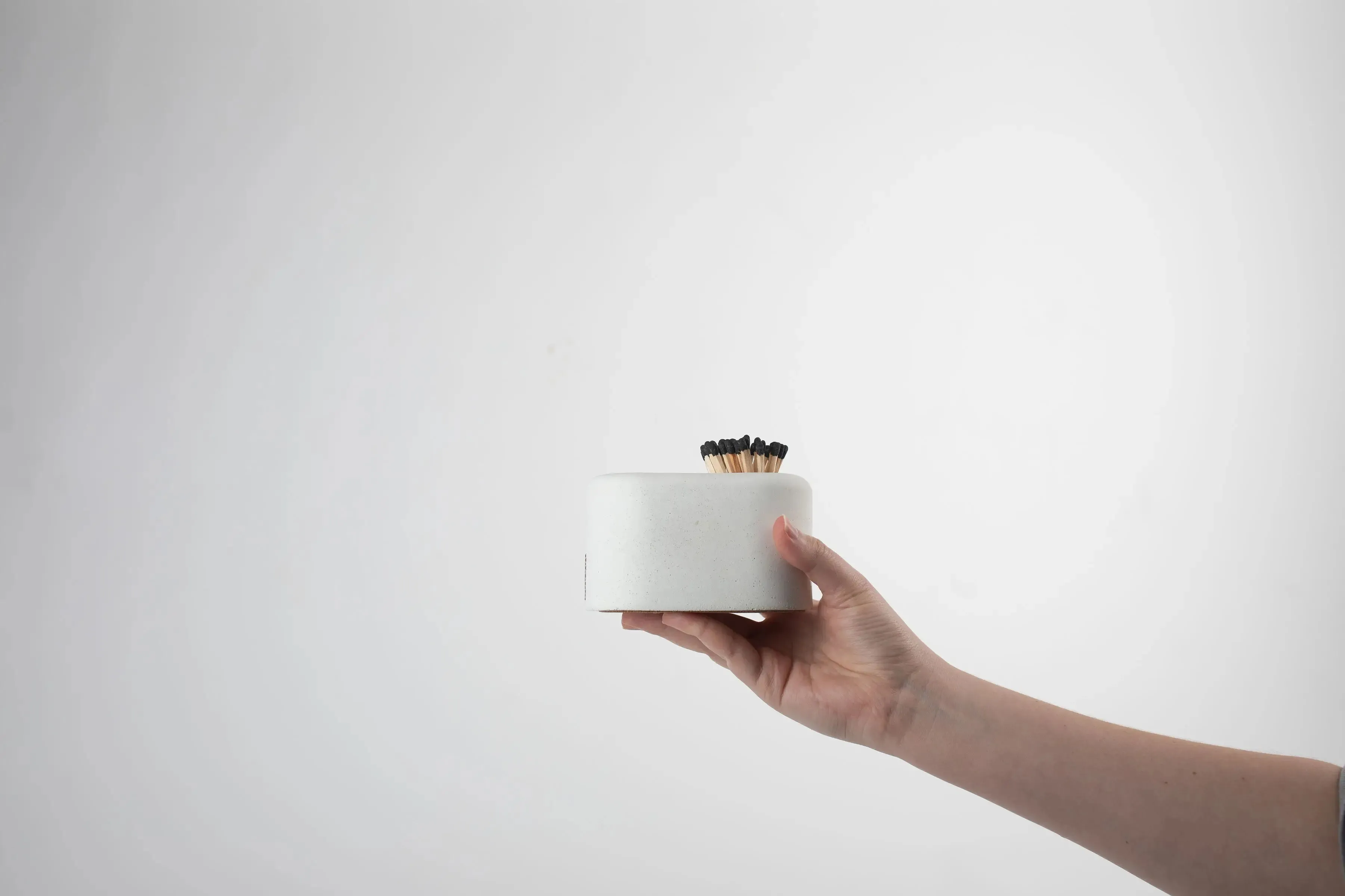 White Streamliner Match Holder with Black Matches